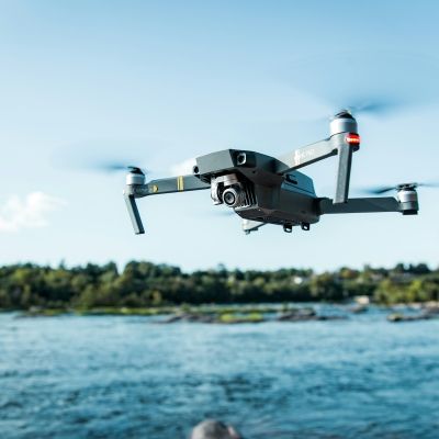 Drone flying over water